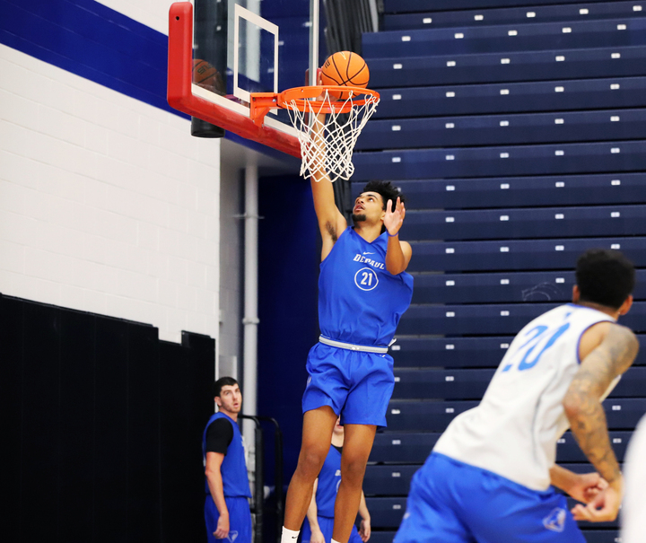 Théo Pierre-Justin goes up for a slam dunk in a DePaul men's basketball practice Monday, Sept. 16, at McGrath-Phillips Arena. The 6-foot-10-inch forward comes to Chicago after winning a gold medal with Team France in the U20 EuroBasket Championships.