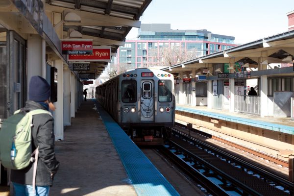 CTA rider waits for southbound Red Line train at Fullerton Station on Jan. 23, 2024. This mouth Federal Transit Administration and Chicago Transit Authority secured funds for south side Red Line extension.