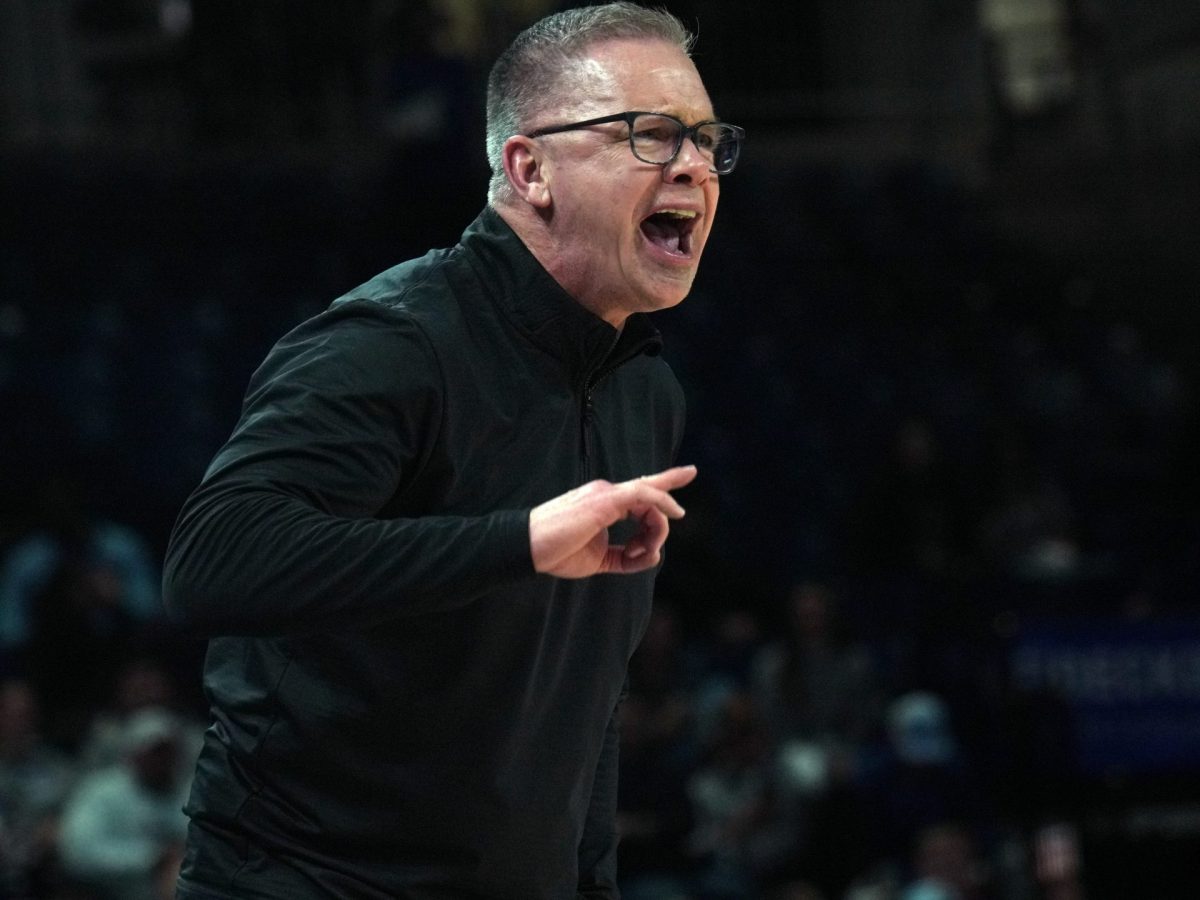 DePaul head coach Chris Holtmann shouts from the Blue Demon bench Tuesday, Jan. 21, 2025, at Wintrust Arena. DePaul's game at Butler on Saturday was Holtmann's first game coaching at Hinkle Fieldhouse in Indianapolis since 2017, when he coached Butler University.