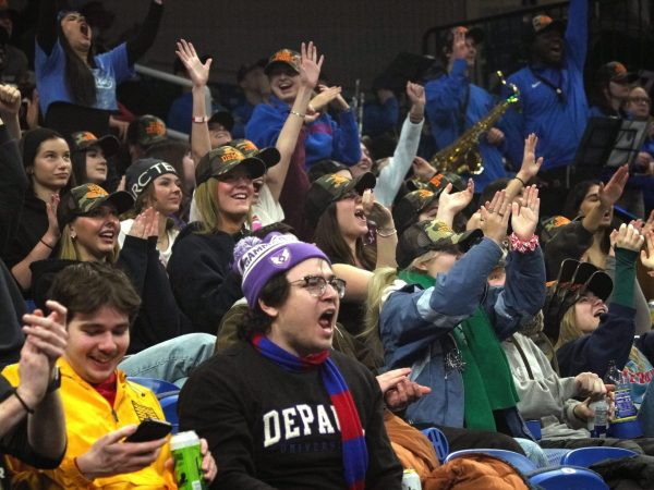 Fans cheer on the men's basketball team as they play against Creighton on Tuesday, Jan. 21, 2025. The men's team lost to Creighton 73-49.