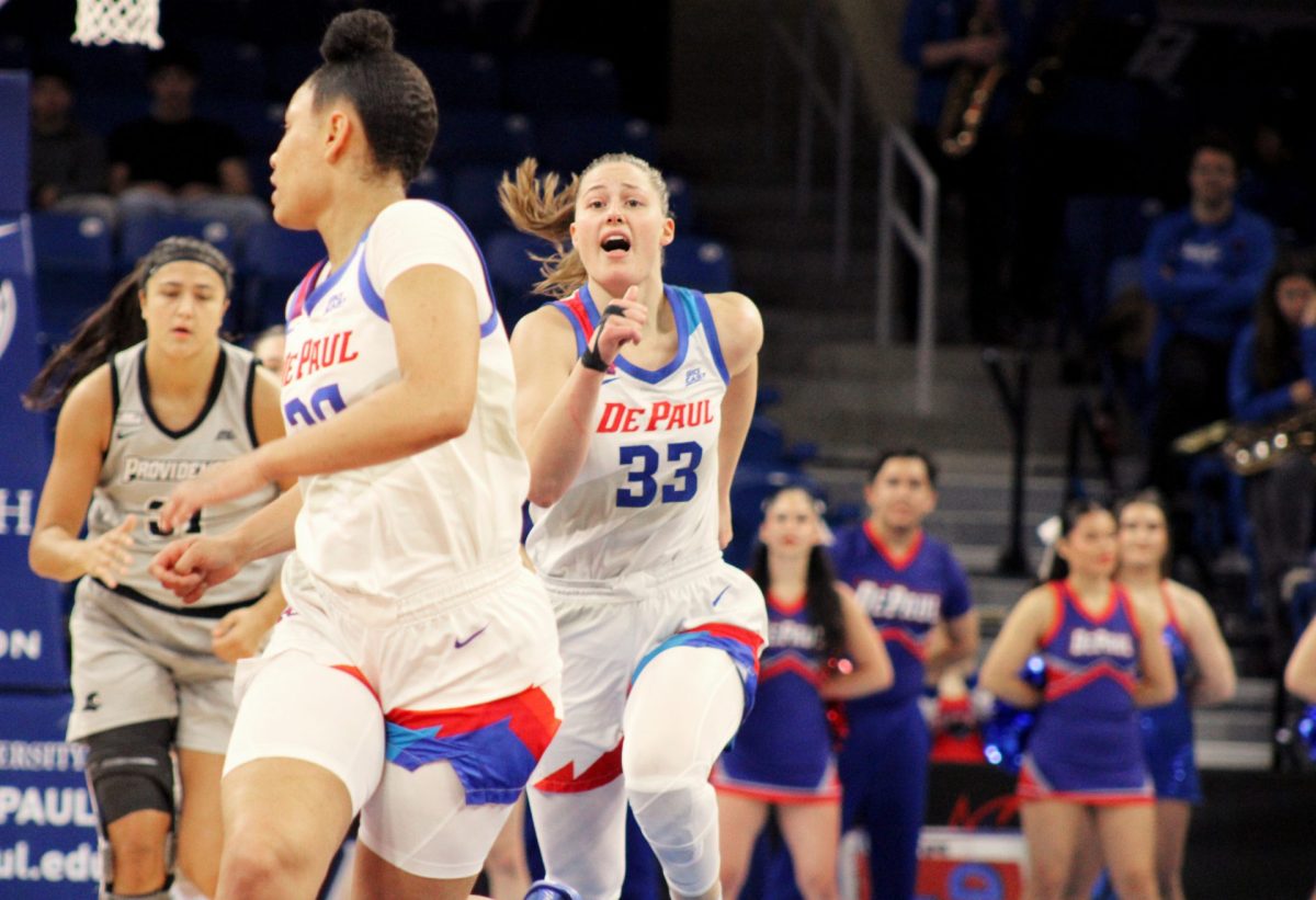 Jorie Allen shouts ahead to her teammates as she makes her way down the court during the first half of DePaul's game against Providence on Sunday, Jan. 12, 2025, at Wintrust Arena. Allen, Meg Newman and Sumer Lee have started all 18 games this season. 