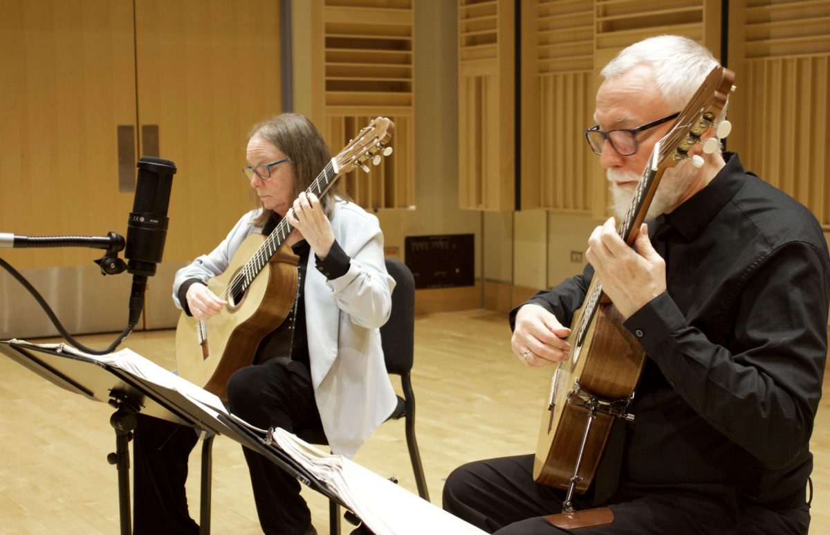 Anne Waller, left, and Mark Maxwell play a concert together at Northeastern Illinois University during the spring of 2024. The duo has been playing together since 1981. "When you get to the point of playing together for so long, it's really a process of not only collaborating on the specific pieces of music, but also evolving a technique. You sound alike, your sound can blend, you can balance sounds, and you have a similar sort of ear for articulation."
Photo provided by Mark Maxwell