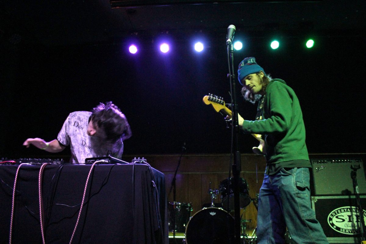 From left: Sam Silbret, DJ, and Scott Turner, singer and guitarist, perform as the band Hooky on Jan 18 at Schubas Tavern. Indie record label Julia's War held a takeover of the bar's main stage that evening. 