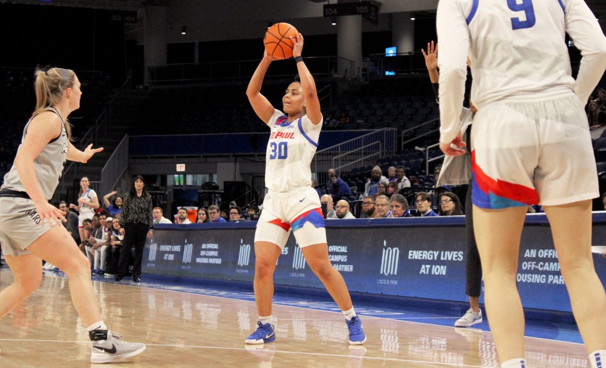 Angelina Smith looks to pass the ball during the first half of DePaul's game against Providence on Sunday, Jan. 12, 2025, at Wintrust Arena. Jill Pizzotti is the interim head coach, but she has been an associate head coach for 11 years for DePaul.