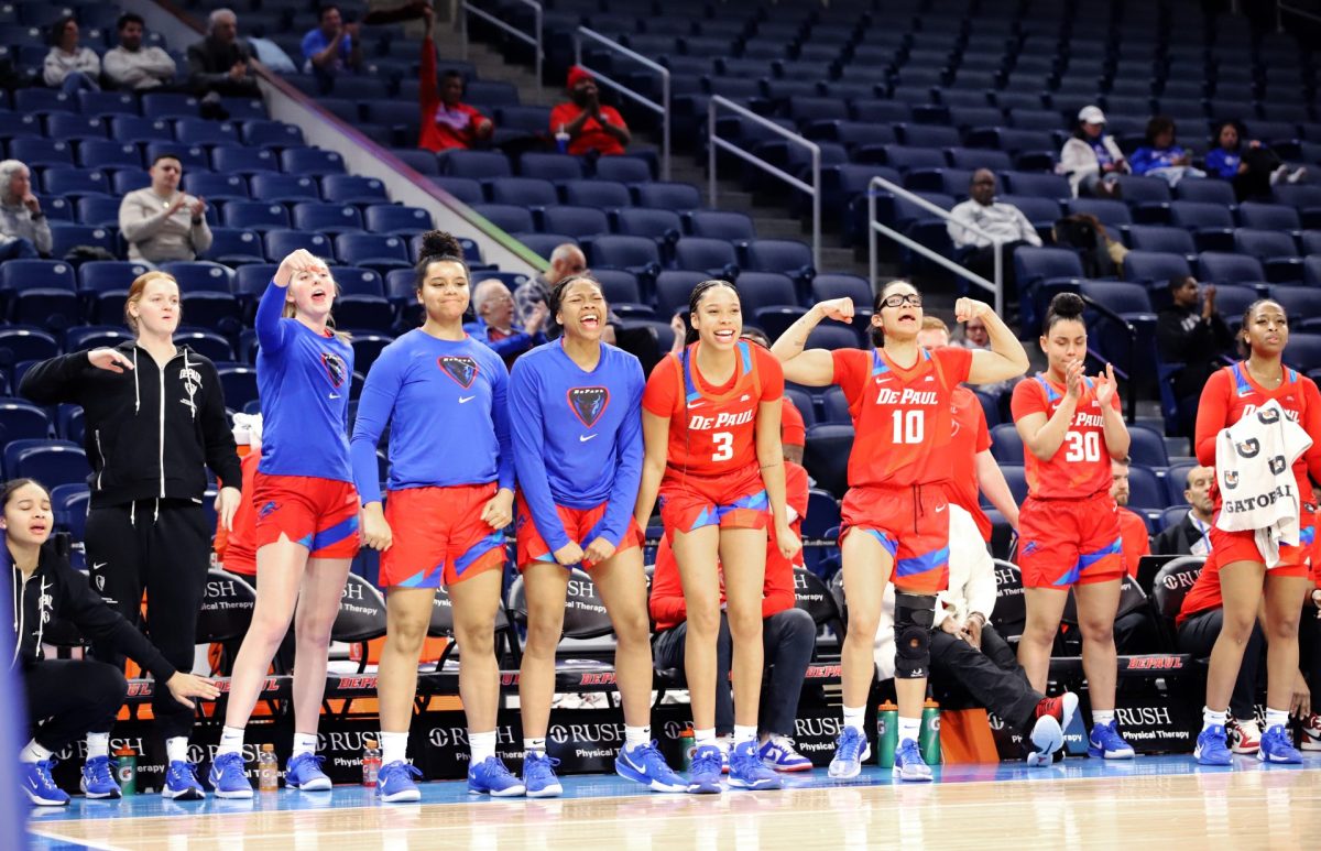 Players on DePaul women's basketball team celebrate their teammates on Wednesday, Jan. 22, 2025, at Wintrust Arena. DePaul won against Xavier, 57-50.