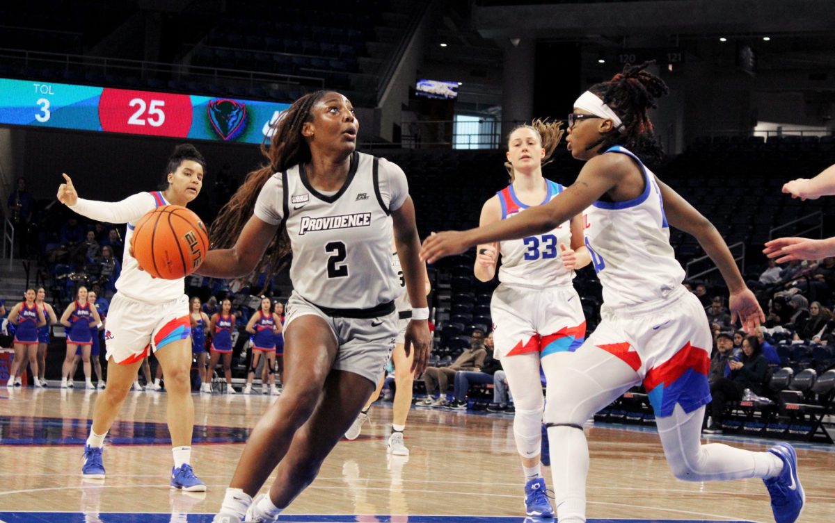 Providence's Grace Efosa looks to drive to the basket while DePaul looks to block during the first half of the game on Sunday, Jan. 12, 2025, at Wintrust Arena. The first half ended with a score of 31-29, with Providence winning. 