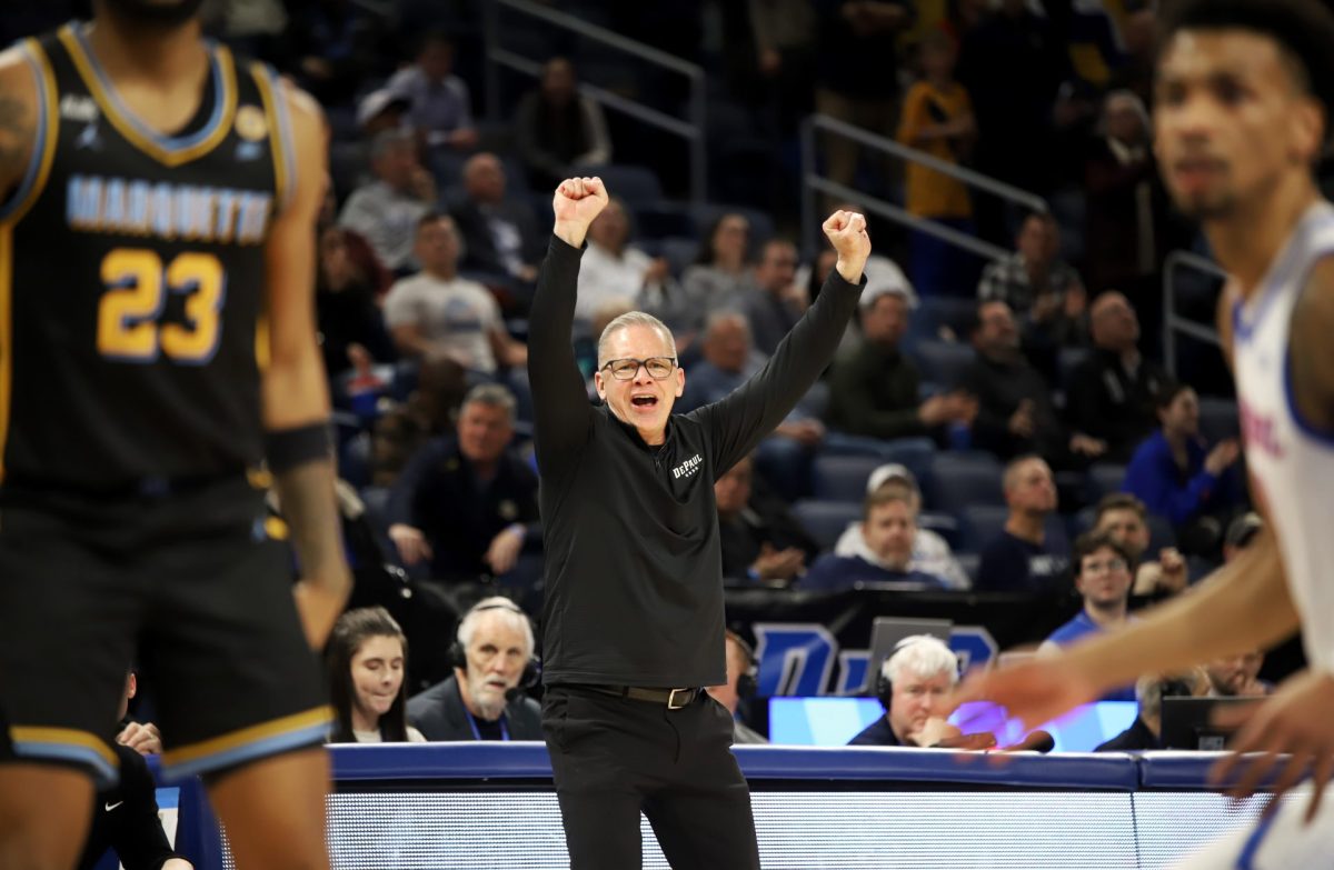 Chris Holtmann celebrates from the sidelines during the second half on Tuesday, Jan. 14, 2025, at Wintrust Arena. DePaul men’s basketball hasn’t won a Big East conference game in 727 days.