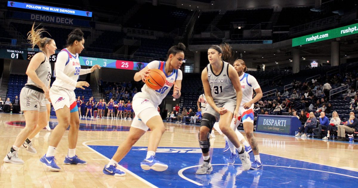 Angelina Smith dribbles towards Olivia Olsen during the first half on Sunday, Jan. 12, 2025, at Wintrust Arena. With 6:20 left in the second quarter, DePaul made their first shot of the quarter.