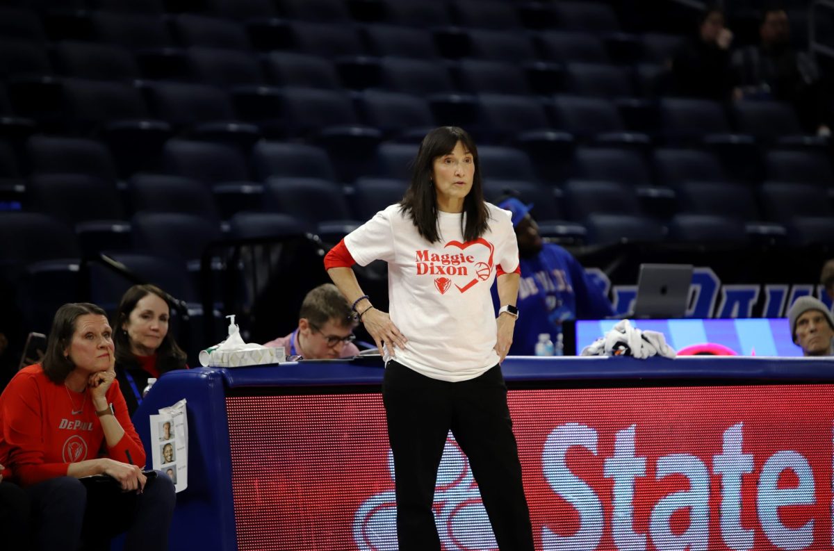 Jill Pizzotti watches her team on the court during their game against Xavier on Wednesday, Jan. 22, 2025, at Wintrust Arena. Pizzotti had gone with a four-guard lineup during the second half.