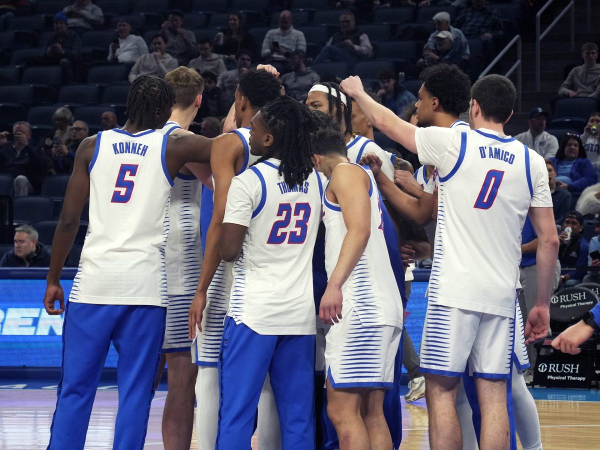 DePaul men's basketball huddles up at the start of the game on Tuesday, Jan. 21, 2025. DePaul won their first Big East game in 730 days against Georgetown on Jan. 17.