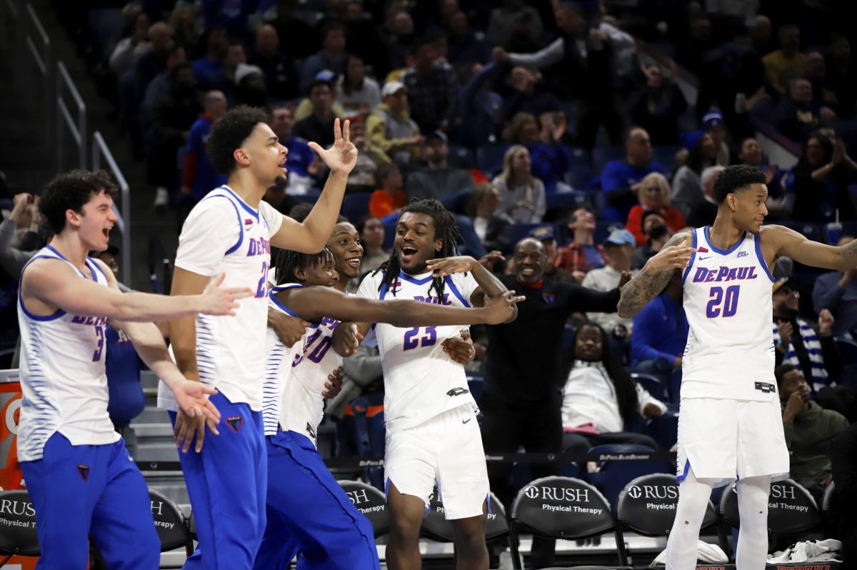 DePaul basketball players celebrate on the bench during the second half of their game against Marquette on Tuesday, Jan. 14, 2025, at Wintrust Arena. CJ Gunn was the highest scorer with 21 points.