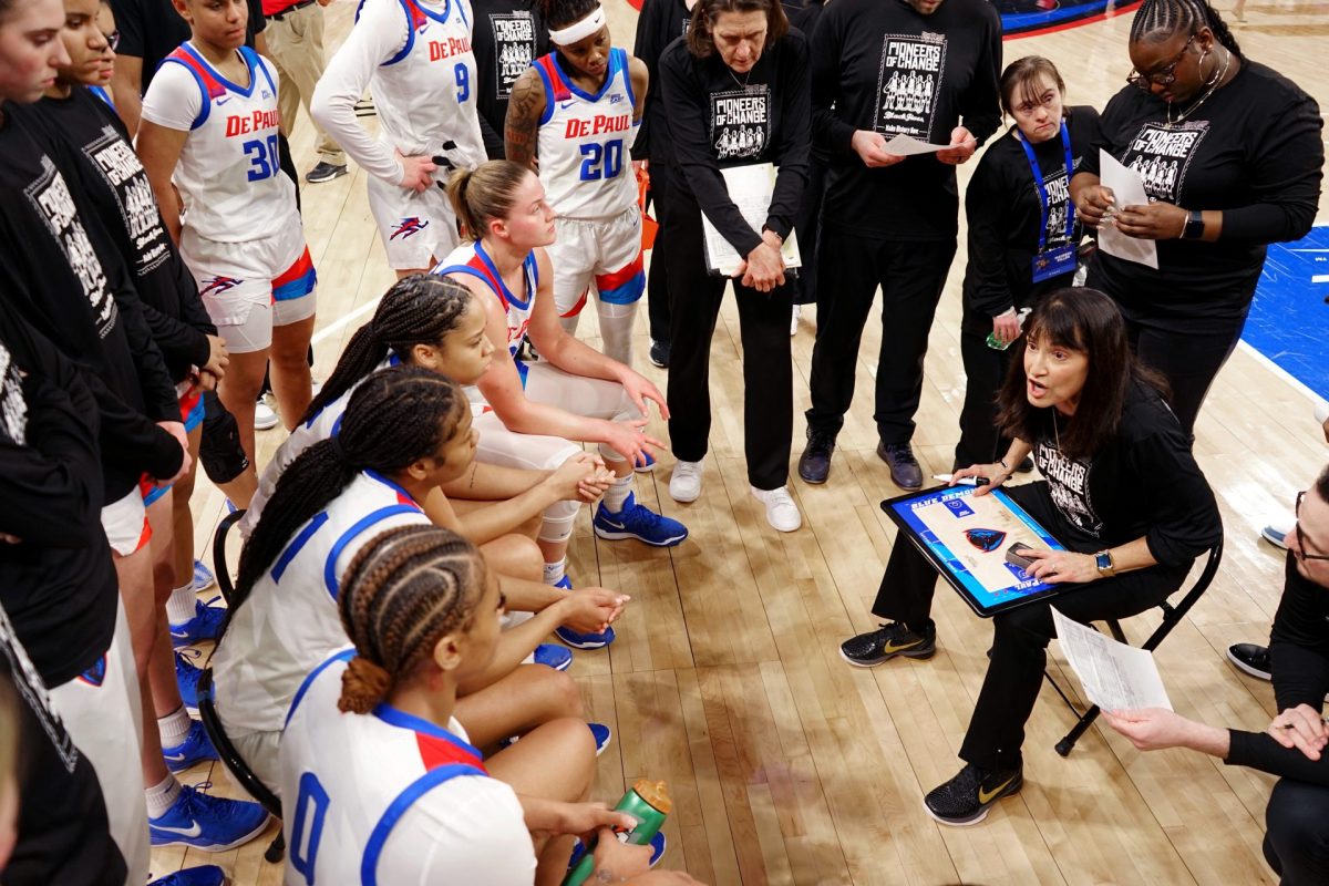 Jill Pizzotti coaches her players during a timeout on Wednesday, Jan. 29, 2025, at Wintrust Arena. An 18-8 second quarter proved to be fatal for the Blue Demons.