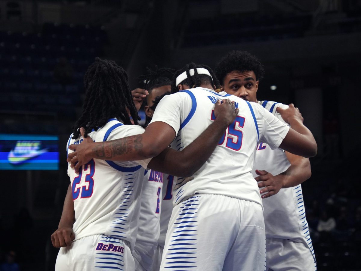 The DePaul men's basketball team huddles during the second half against Creighton on Tuesday, Jan. 21, 2025. DePaul struggled to keep up with Creighton after a flurry of points made against them in the second half.