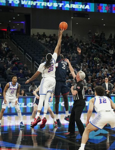 DePaul forward, NJ Benson, jumps for the ball against UConn on Wednesday, Jan. 1, 2025, at Wintrust Arena. Benson scored 10 points in the 81-68 loss.