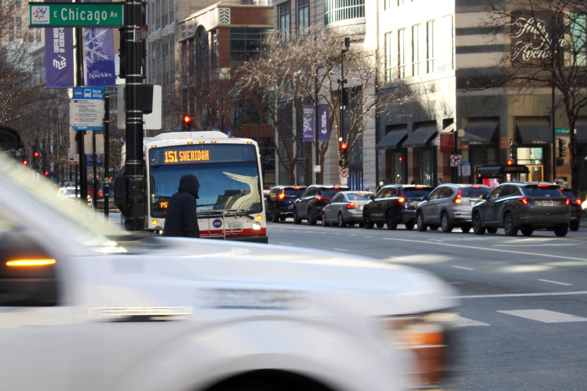 A car zooms by during morning rush hour on Friday, Jan. 17, 2025, at the corner of Chicago Ave. and Michigan Ave. In 2024, Chicago had some of the worst traffic in the United States. 