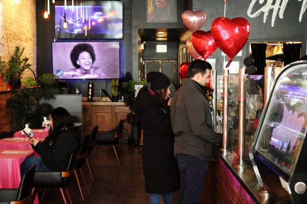 Patrons of Chi'Tiva order at the counter on Friday, Feb. 14, 2025. Charles Wu founded Chi’Tiva cannabis lounge in 2022, located in Chicago’s Bucktown neighborhood.