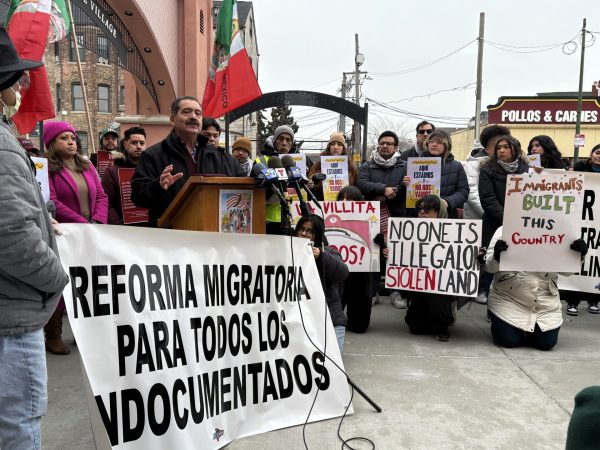 Illinois Rep. Jesus “Chuy” Garcia speaks at a press conference during a Day of Love and Resistance in the Little Village neighborhood of Chicago on Saturday, Feb. 8, 2025. Protestors gathered at the Little Village Arch to distribute signs that educate people about their rights. 