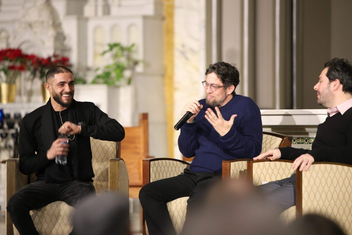 Arab Aramin and Guy Elhanan speak at The Parents Circle-Families Forum on Tuesday, Feb. 11, 2025. The organization's mission is to foster dialogue and understanding between both sides, believing in the power of human connection over violence. 