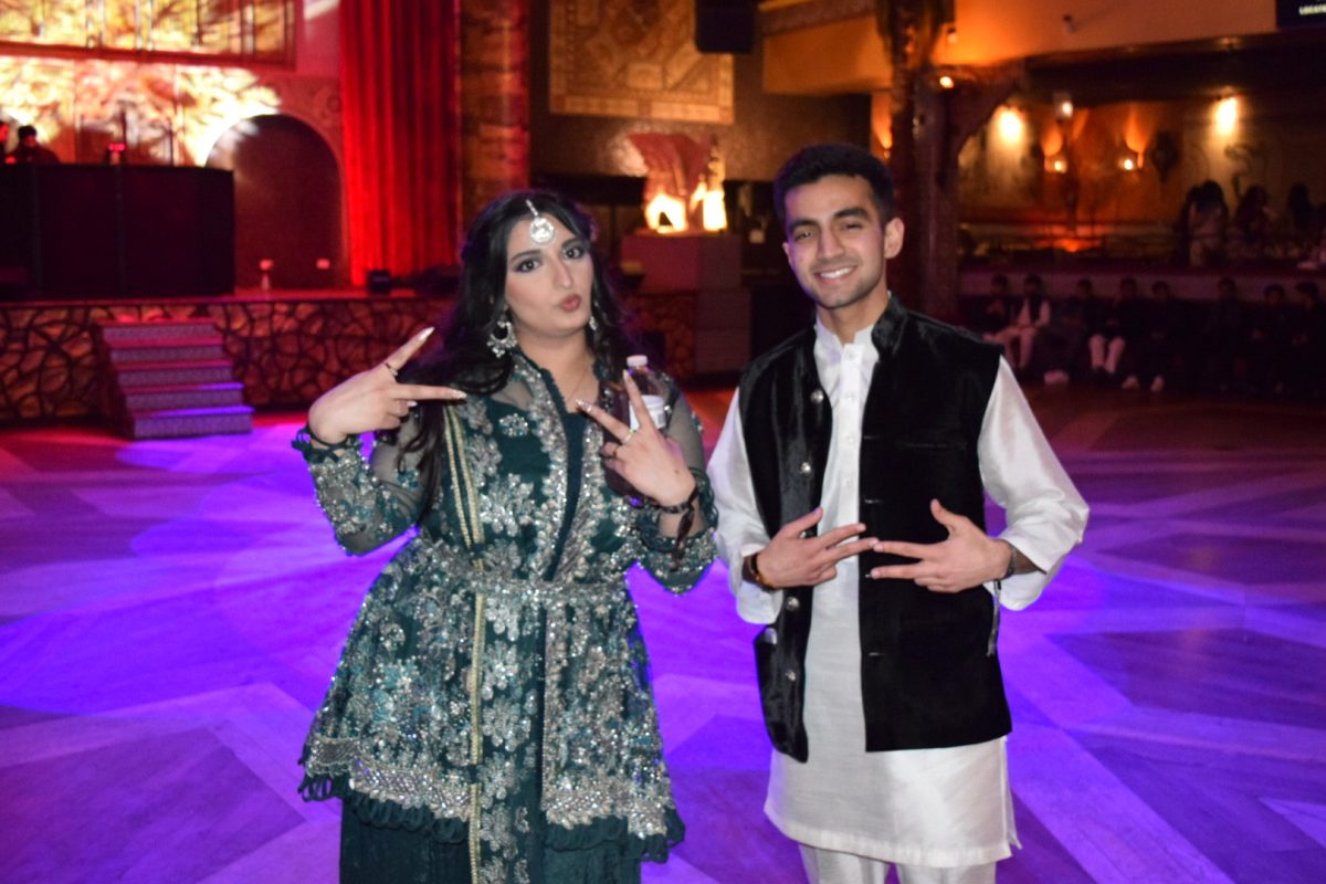 Hamna Zaidi (left) & Shahbaz Ahmed (right) pose on Sunday, Feb. 16, 2025, at the Pakistani Student Met Gala. The event is hosted by the DePaul Pakistani Student Association, of which Zaidi and Ahmed are members. 