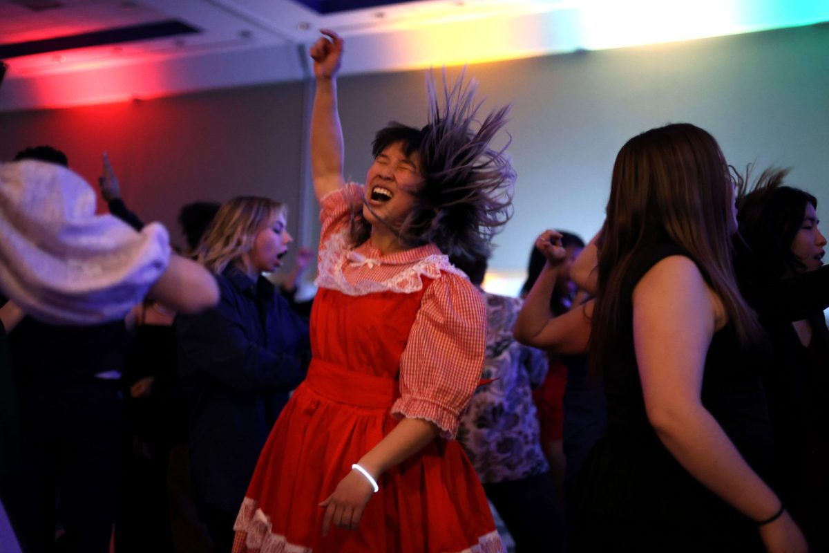 Kiersten Hung dances during DePaul's Queer Prom event on Thursday, Feb. 13, 2025. The dance is held every year by the campus LGBTQIA+ Resource Center.