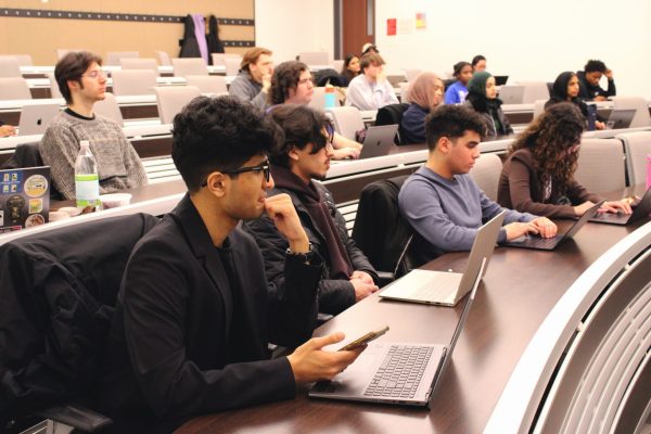 Jazib Waqar Raza listens during a Student Government Association general body meeting on Wednesday, Feb. 19, 2025, in McGowan South. SGA’s “speaker series” of inviting administration to talk at general body meetings is a way they are trying to promote conversation.