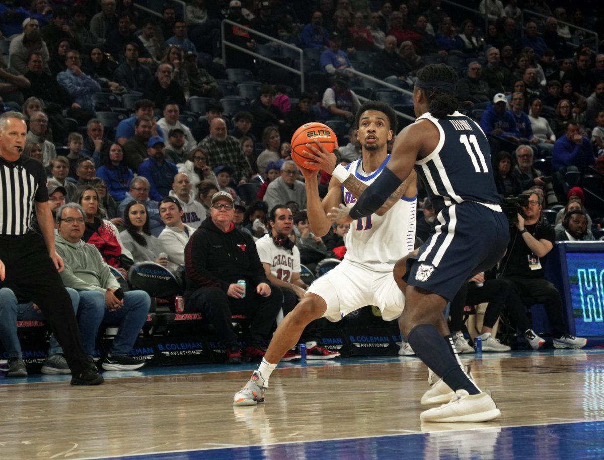 CJ Gunn looks to make a pass against Butler on Saturday, Feb. 23, 2025, at Wintrust Arena. Besides Conor Enright, who is currently injured and averages the most minutes per game (30), CJ Gunn averages the most with 25.