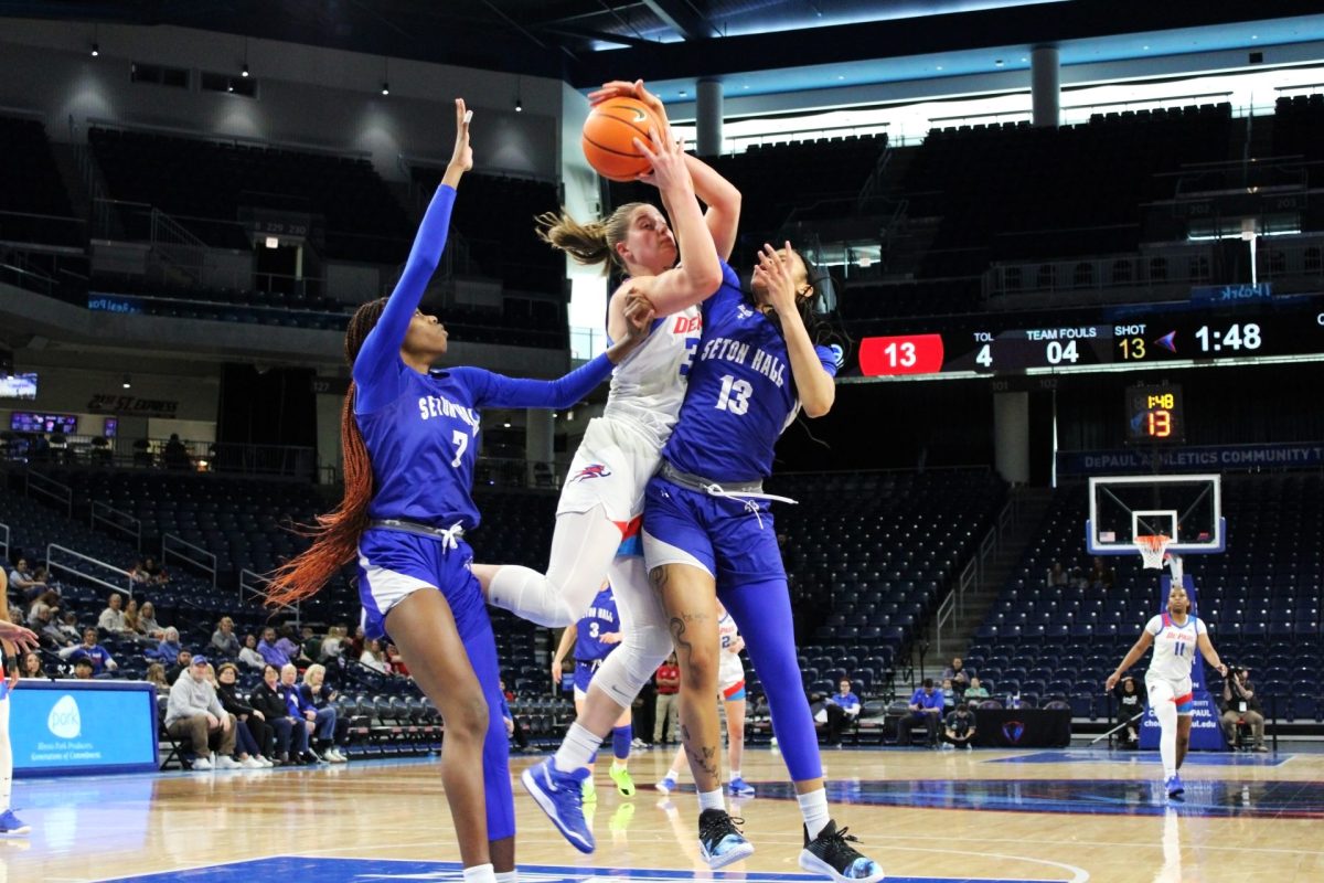 Jorie Allen and Messiah Hunter fight for control of the ball during the first half of Friday's game on Feb. 2, 2025. Jorie Allen has started in all 24 games this season.