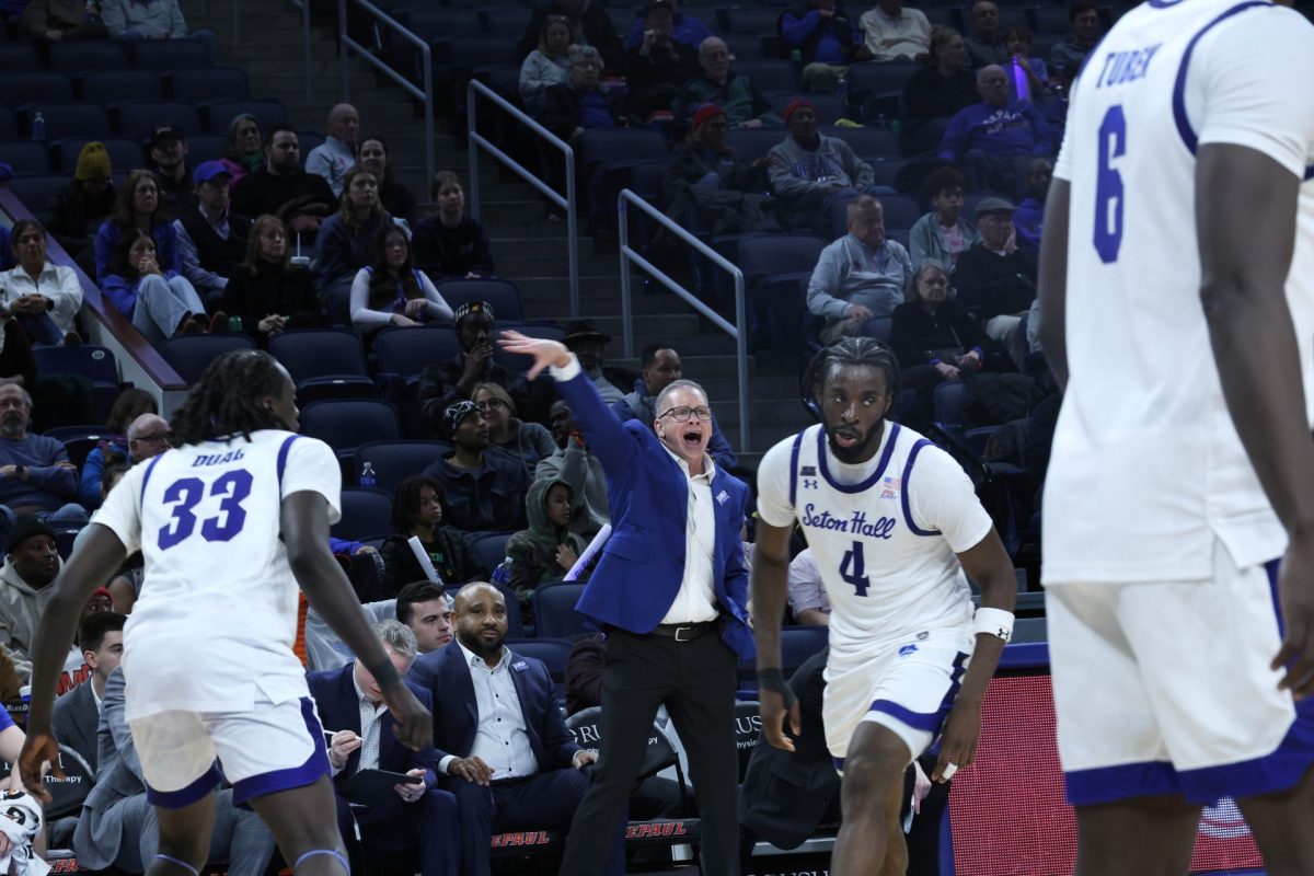 DePaul men’s basketball head coach Chris Holtmann shouts from the bench during the game against Seton Hall on Sunday, Feb. 2, 2025. DePaul won 74-57. (Photo by Kit Wiberg)