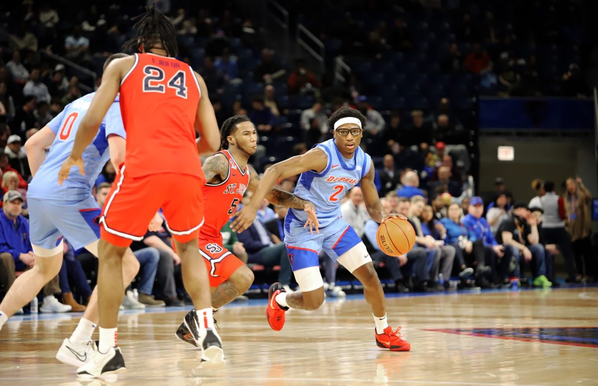 Layden Blocker dribbles around St. Johns on Wednesday, Feb. 19, 2025, at Wintrust Arena. DePaul is on a three game losing streak.