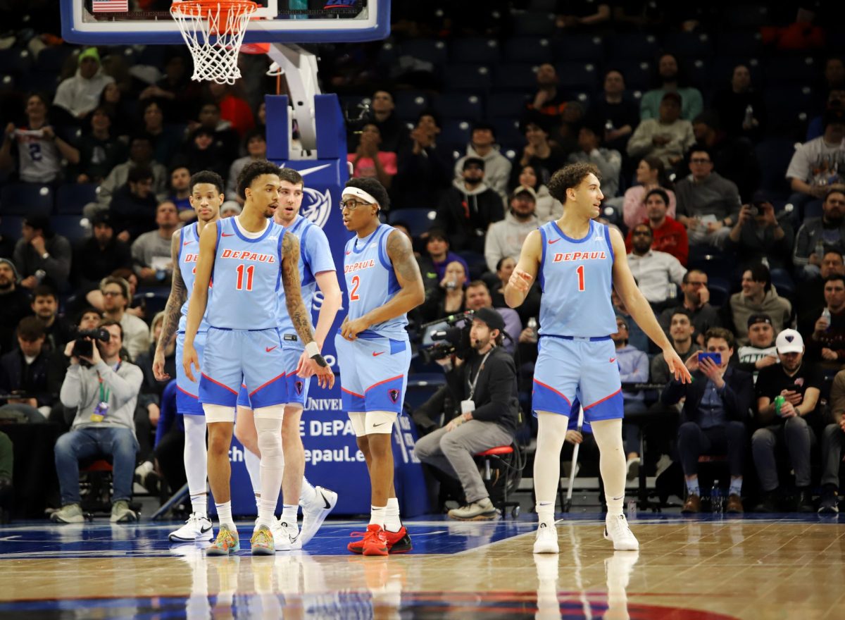 The DePaul men's basketball team regroups on the court during their game against St. Johns on Wednesday, Feb. 19, 2025, at Wintrust Arena. Before tonight's game, DePaul is currently 2-13 in Big East conference play.