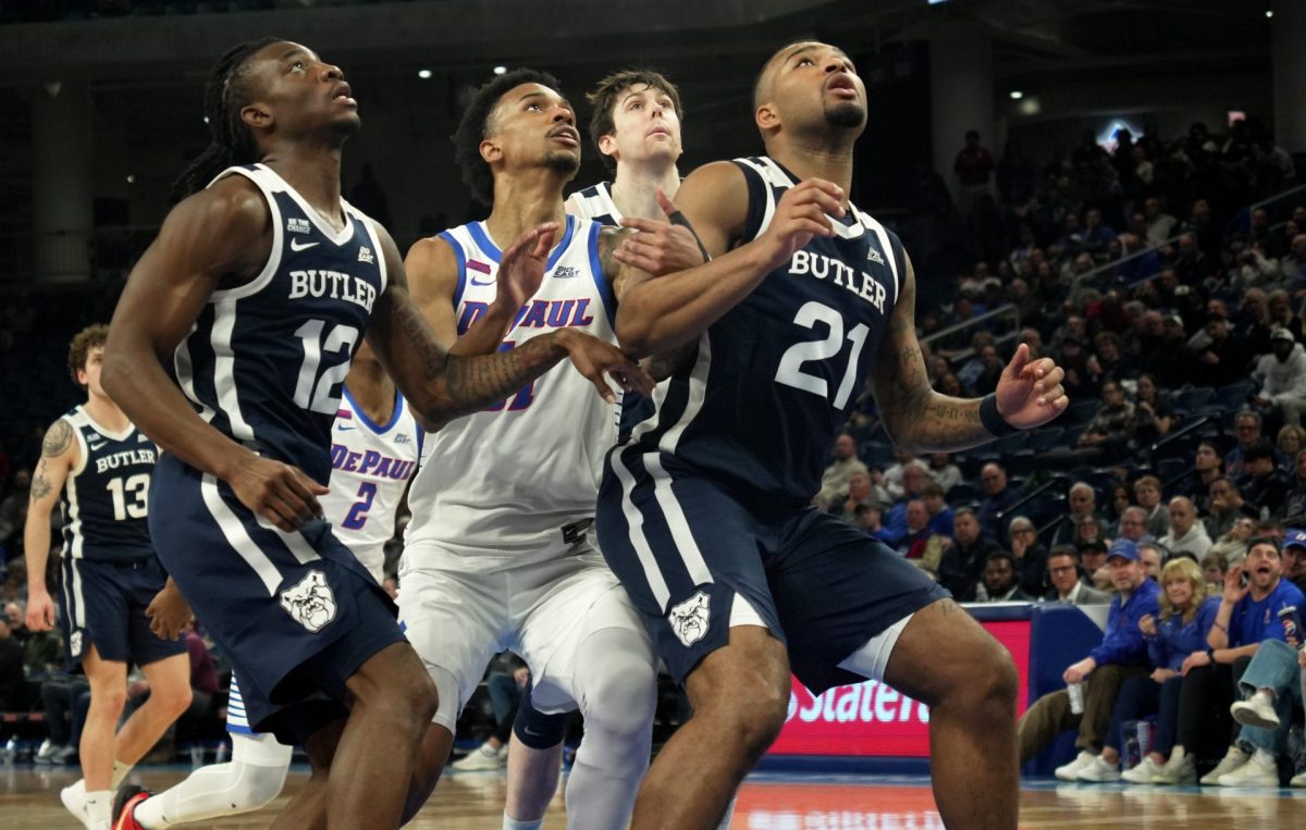 Butler's Kolby King and Pierre Brooks II and DePaul's CJ Gunn, center, wait for a rebound on Saturday, Feb. 22, 2025, at Wintrust Arena. DePaul averages 35.4 rebounds per game.