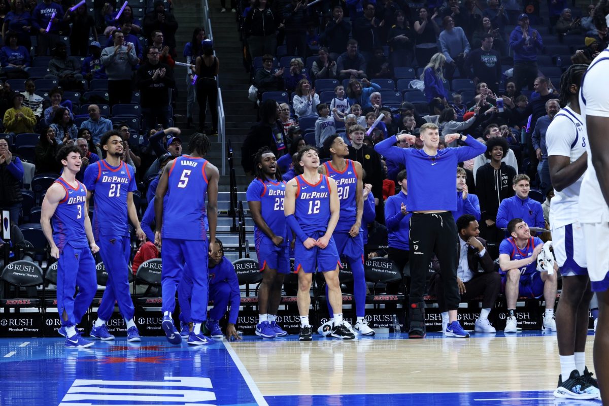 DePaul men's basketball celebrates at the bench during the second half of Sunday's game on Feb. 2, 2025. This is DePaul's first Big East home win this season.