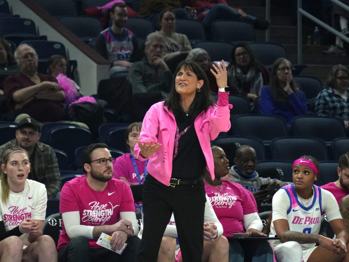 DePaul women's basketball Interim Head Coach Jill Pizzotti shouts from the bench on Wednesday, Feb. 12, 2025. DePaul trailed close behind Villanova in points during the second half of the game.