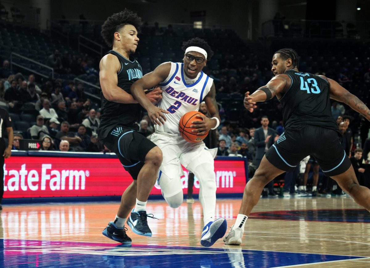 Layden Blocker works around Villanova on Wednesday, Feb. 5, 2025, at Wintrust Arena. DePaul lost to Villanova, 49-59. 