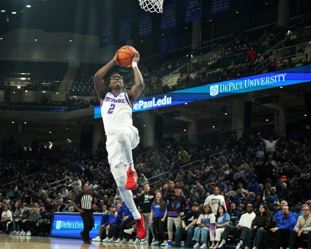 Layden Blocker jumps into the air towards the basket on Saturday, Feb. 22, 2025, at Wintrust Arena. " ... I just got to get back into that rhythm and that confidence that I had preseason," Blocker said.