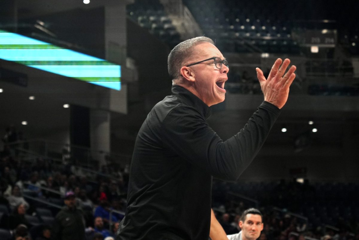 Chirs Holtmann yells at his players during the second half on Wednesday, Feb. 5, 2025, at Wintrust Arena. “It was night and day,” Holtmann said. “I thought we’ve gotten better as a group in the last month, for sure. We’d obviously love to be at full strength … but it’s night and day.”