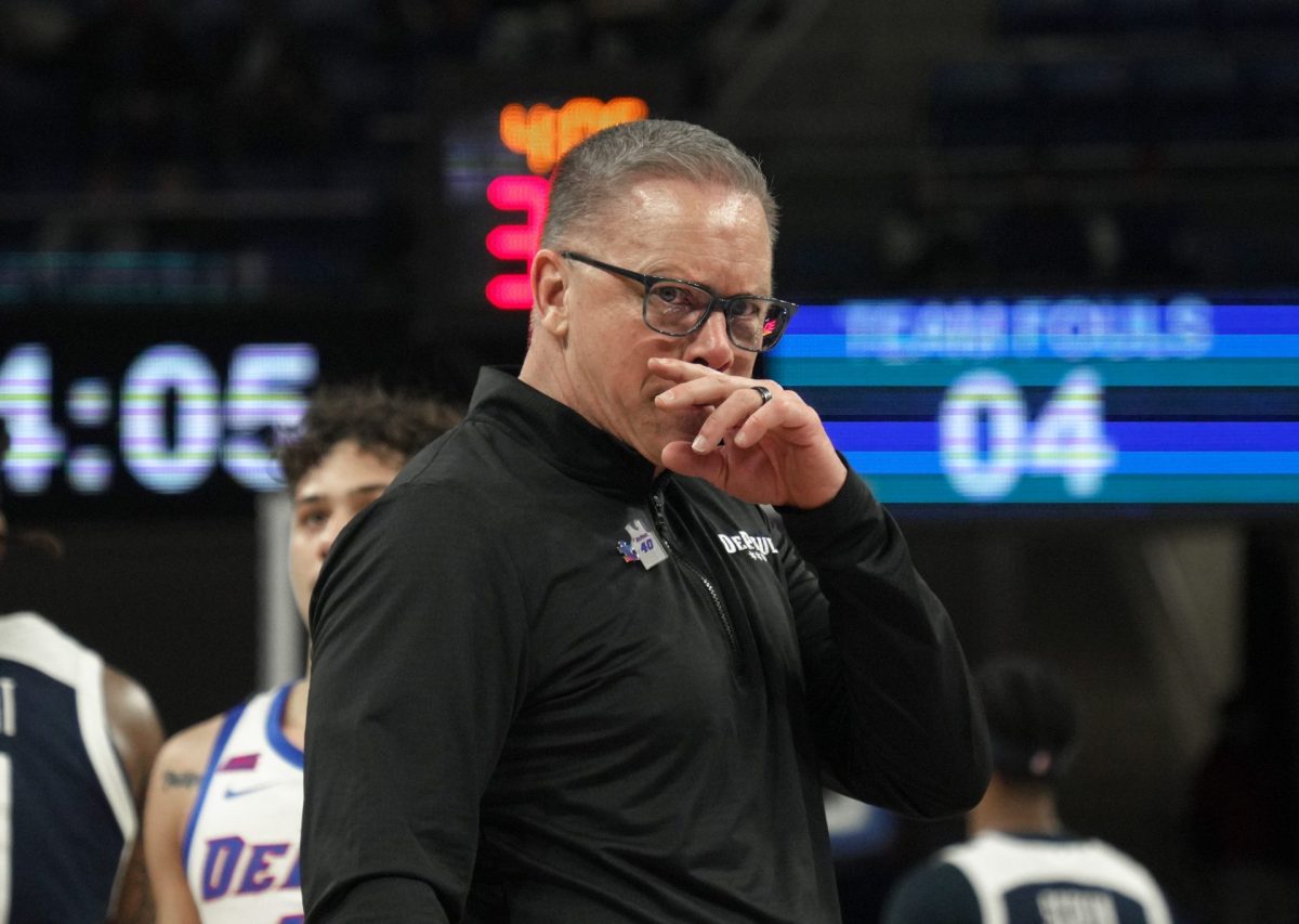 Chris Holtmann watches DePaul's game against Butler on Saturday, Feb. 22, 2025, at Wintrust Arena. Holtmann wants to see growth and a better defensive effort from his team. 