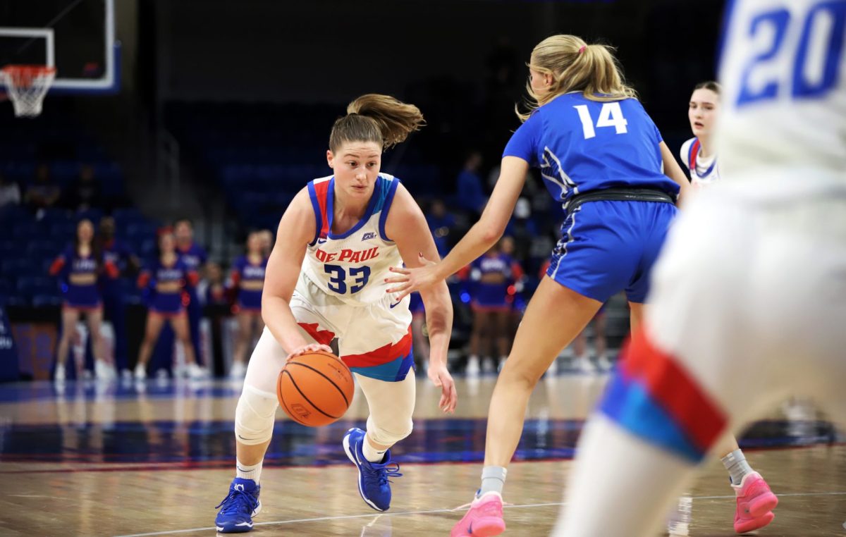 Jorie Allen works around Mallory Brake on Sunday, Feb. 23, 2025, at Wintrust Arena. "This is my home, this is my family, so I’m soaking up every last second I have," Allen said. 