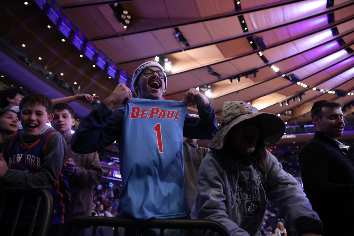 Michael Ansari shows off his baby blue DePaul jersey after the team's win on Wednesday, March 12, 2025, at Madison Square Garden. The Blue Demons defeated the seven seed Georgetown Hoyas 71-67.