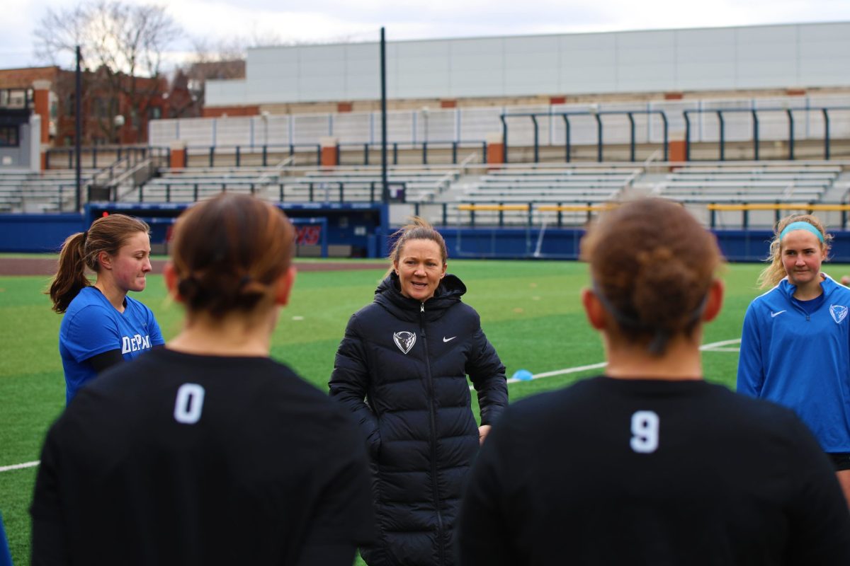 Michele O'Brien talks to her team before beginning practice at Wish Feld on Thursday, Feb. 27, 2025. O'Brien's contract as head coach was extended through January 2028.