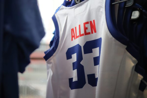 Jorie Allen's jersey hangs in DePaul's NIL shop inside Wintrust Arena on Sunday, Feb. 23, 2025. Before NIL, schools could not sell merchandise featuring their players' names.