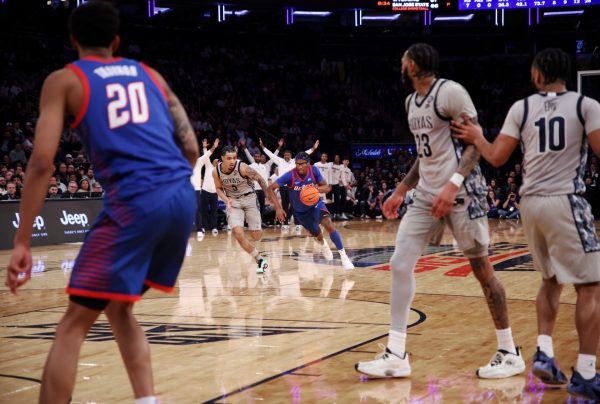 Layden Blocker drives down the court while Micah Peavy keeps up on Wednesday, March 12, 2025, at Madison Square Garden. DePaul won round one of the Big East Tournament against the Georgetown Hoyas. 