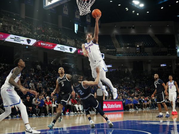 Isaiah Rivera jumps towards the basket while Malik Mack falls back on Saturday, March 8, 2025, at Wintrust Arena. If they win this game, they will head into the Big East Tournament on a 2-game winning streak. 