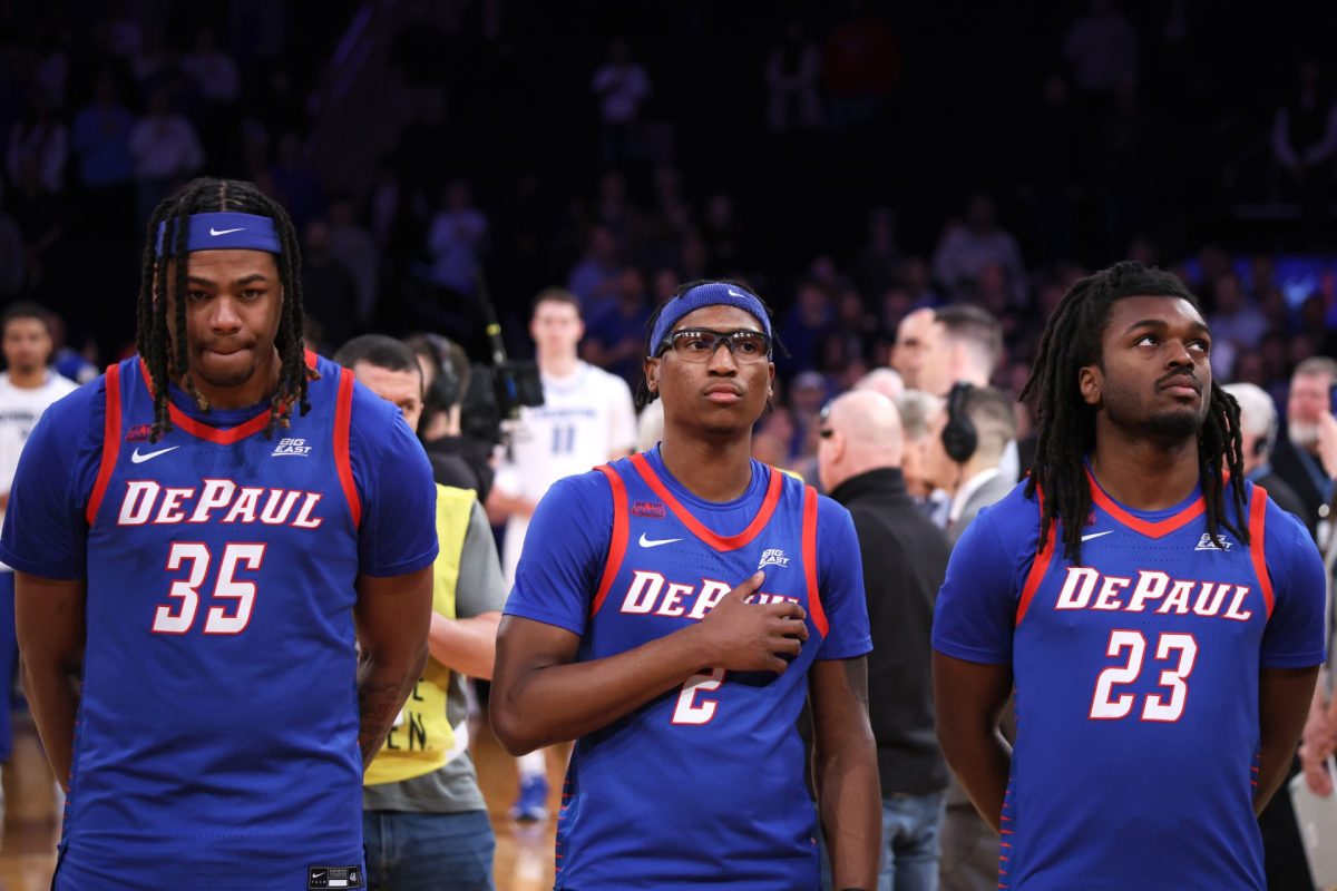 NJ Benson, Layden Blocker and David Thomas line up for the pledge of allegiance before DePaul's game on Thursday, March 13, 2025, at Madison Square Garden. DePaul's overall record this season is 14-18. 