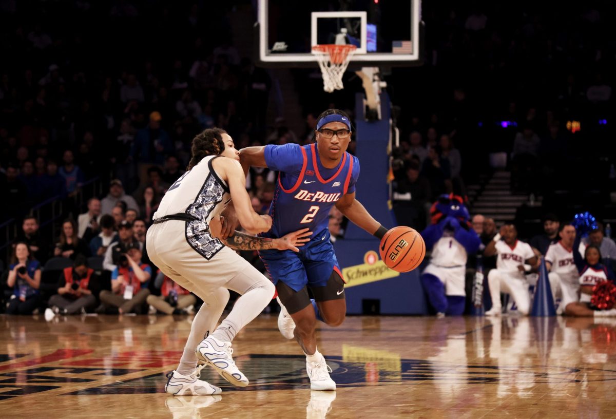 Layden Blocker dribbles down the court while Malik Mack guards on Wednesday, March 12, 2025, at Madison Square Garden. Blocker had 10 points in the first half. 