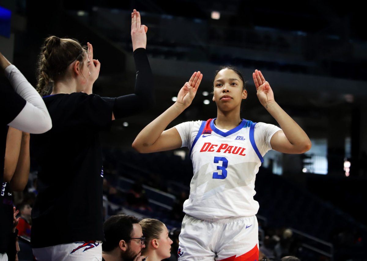 Charlece Ohiaeri celebrates with Ellery Minch against St. John's on Sunday, March 2, 2025 at Wintrust Arena. This was DePaul's last home game of the 2024-25 season.