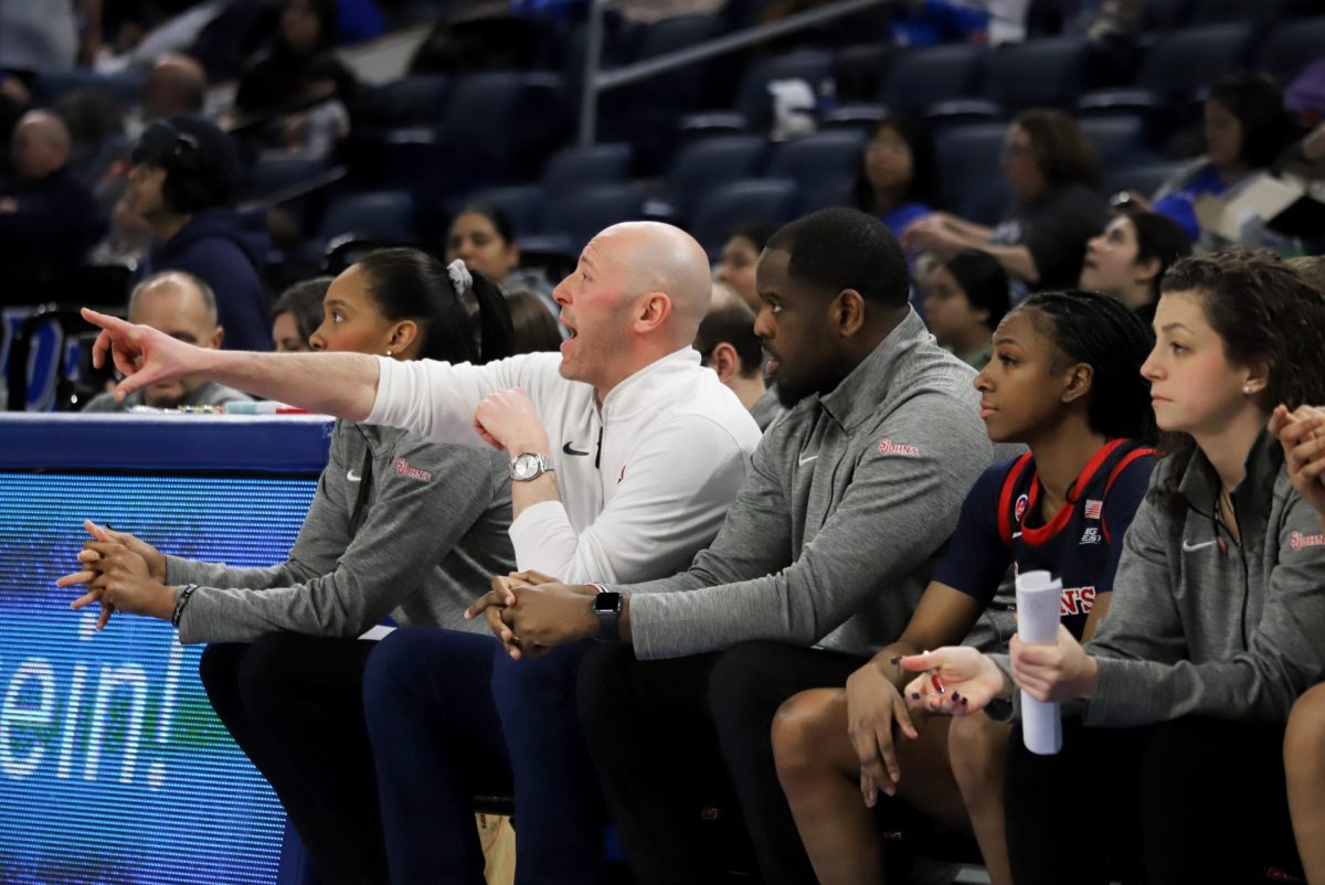 St. John's head coach Joe Tartamella yells at his team during the first half on Sunday, March 2, 2025, at Wintrust Arena. St. John’s currently sits in eighth place with a 5-12 conference record.