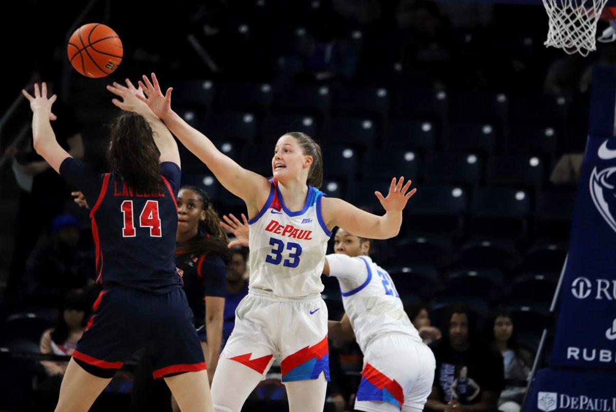 Jorie Allen tries to block a pass from Kylie Lavelle on Sunday, March 2, 2025, at Wintrust Arena. Allen has played for DePaul for five seasons.