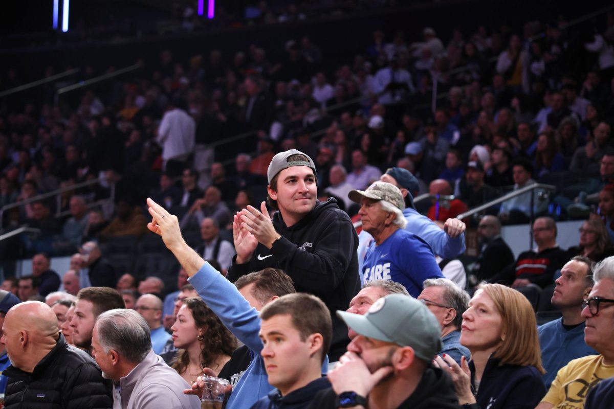 A fan celebrates from the stands on Thursday, March 13, 2025, at Madison Square Garden. DePaul stayed in the lead against Creighton in the first half.