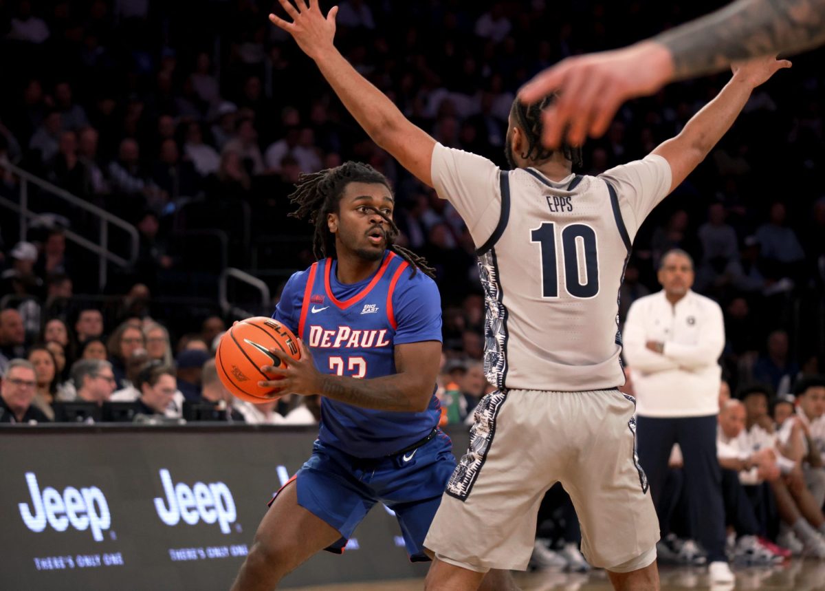 David Thomas looks for a pass while Jayden Epps tries to block on Wednesday, March 12, 2025, at Madison Square Garden. Epps missed a free throw which allowed DePaul the possession to win. 